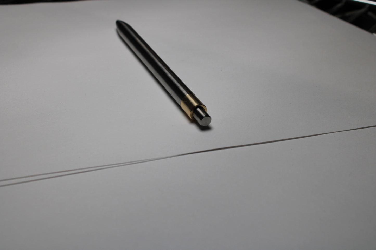 36 Clipless Click Pen - 6Al-4V Titanium - 464 Brass Mechanism - Round Nose - Pentel EnerGel