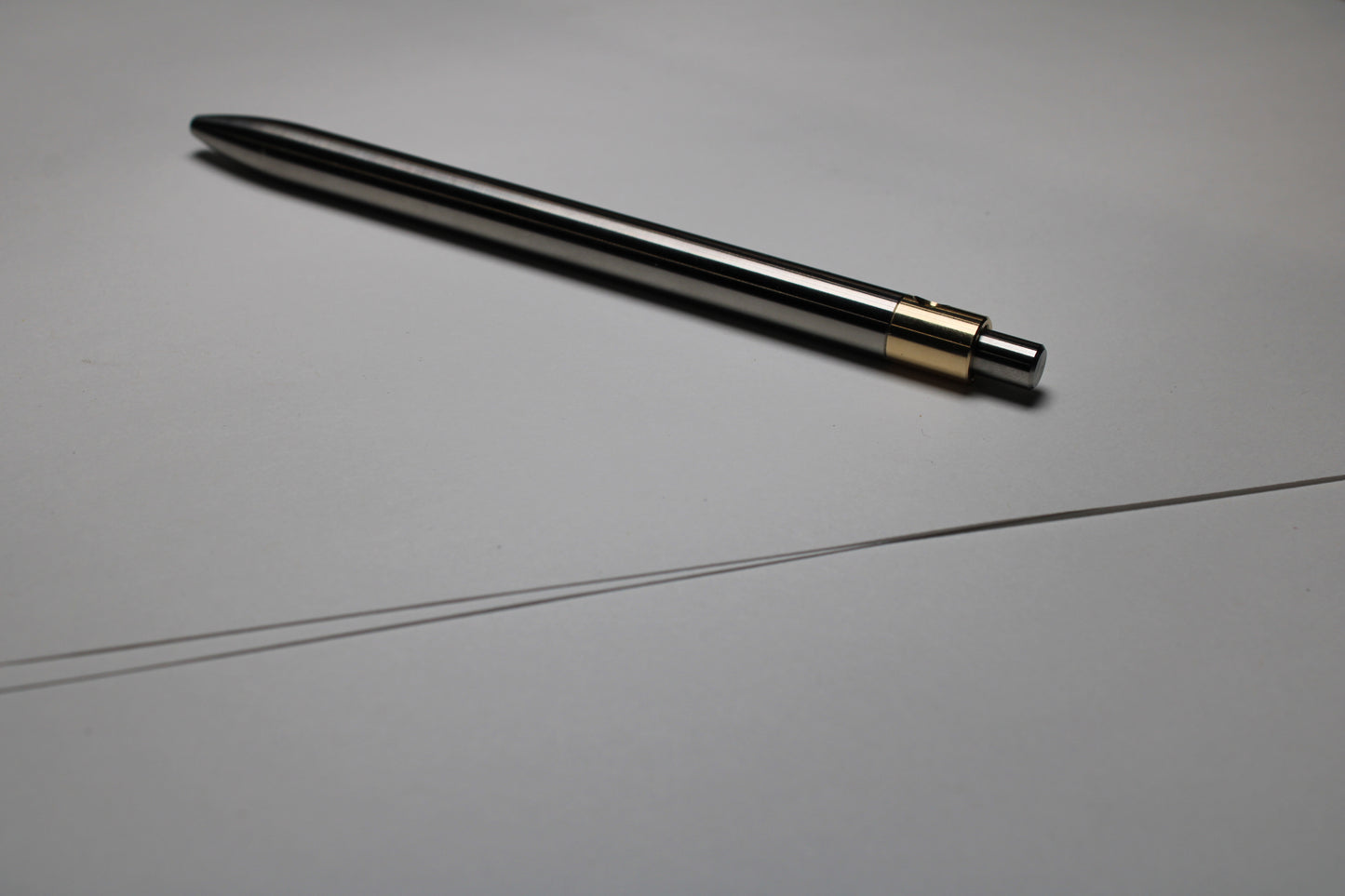 36 Clipless Click Pen - 6Al-4V Titanium - 464 Brass Mechanism - Round Nose - Pentel EnerGel