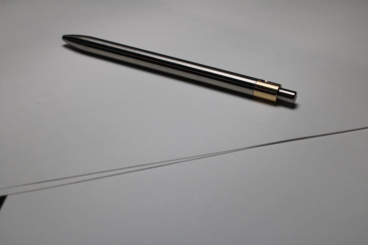 36 Clipless Click Pen - 6Al-4V Titanium - 464 Brass Mechanism - Round Nose - Pentel EnerGel