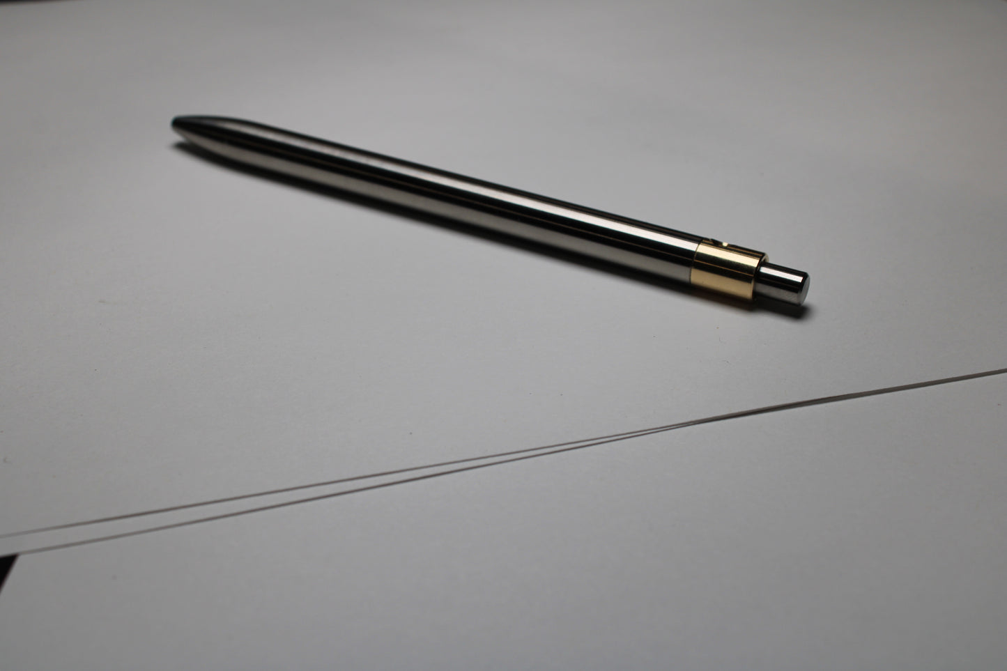 36 Clipless Click Pen - 6Al-4V Titanium - 464 Brass Mechanism - Round Nose - Pentel EnerGel