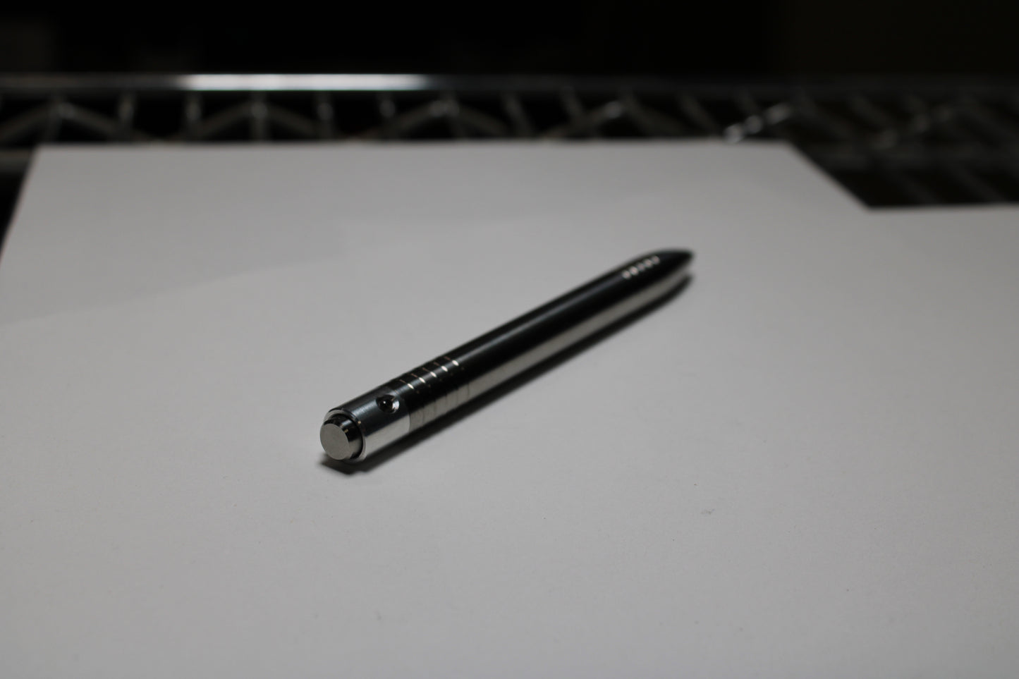 40 Clipless Click Pen - 6Al-4V Titanium - 6061 Aluminum Mechanism - Round Nose - Grip Lines - ISO G2 Schmidt EF9000 Refill