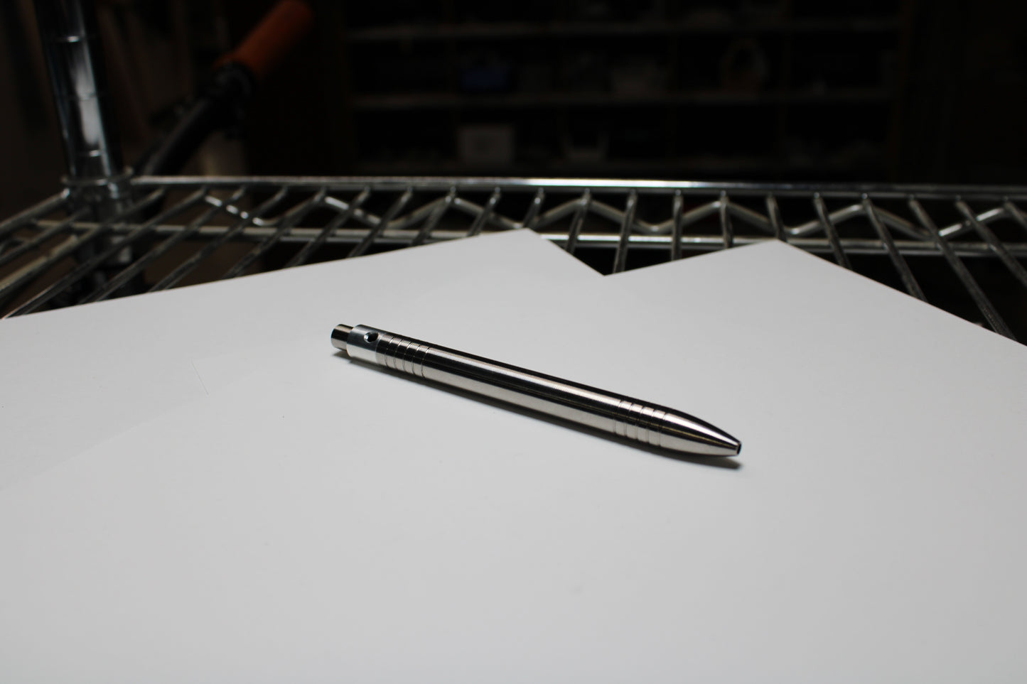 40 Clipless Click Pen - 6Al-4V Titanium - 6061 Aluminum Mechanism - Round Nose - Grip Lines - ISO G2 Schmidt EF9000 Refill