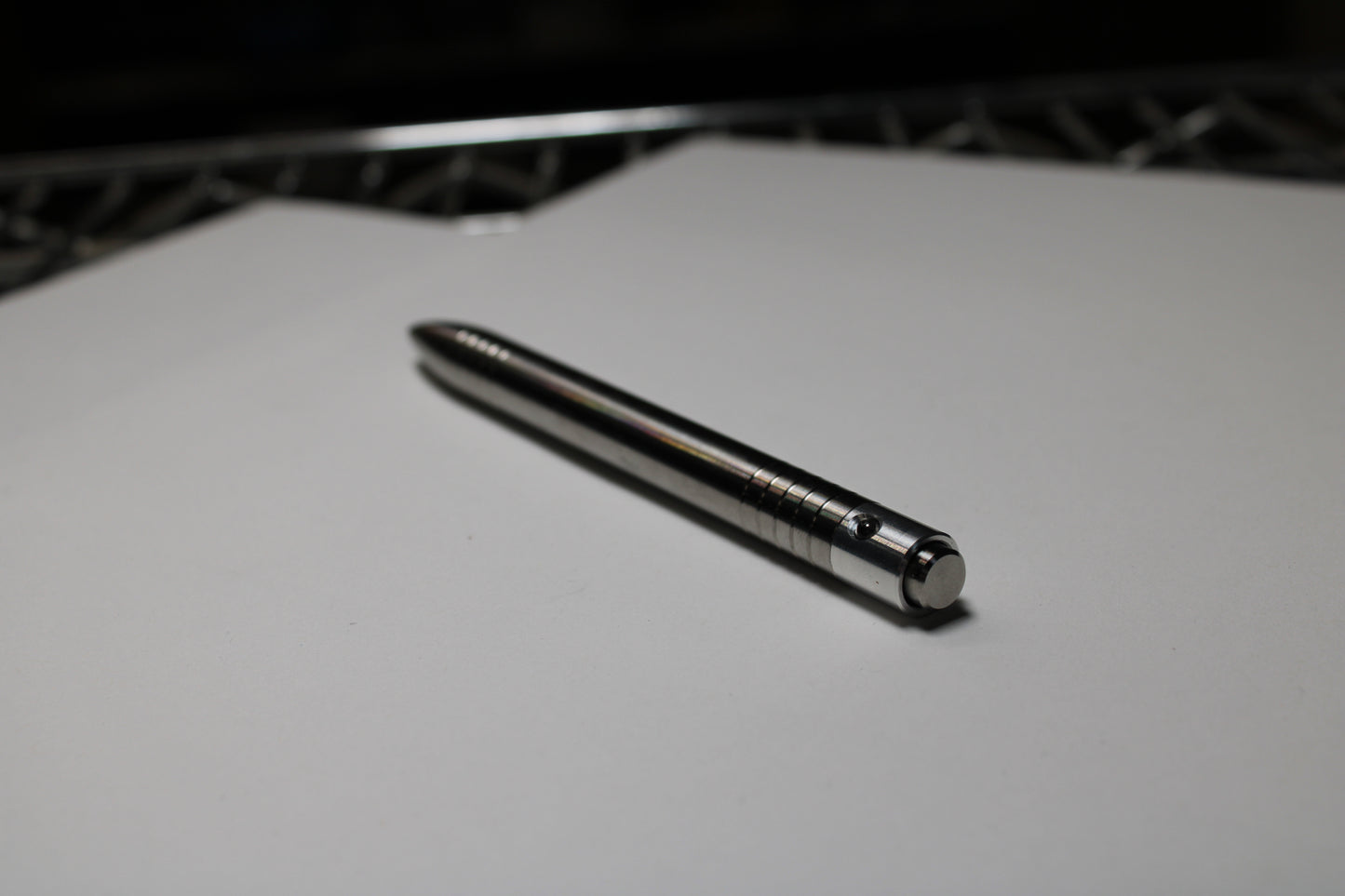 40 Clipless Click Pen - 6Al-4V Titanium - 6061 Aluminum Mechanism - Round Nose - Grip Lines - ISO G2 Schmidt EF9000 Refill