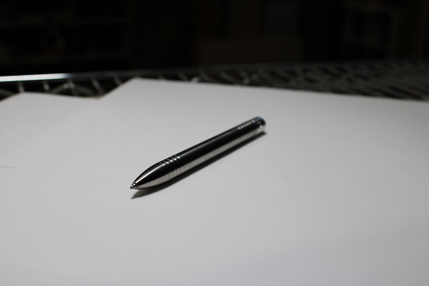 40 Clipless Click Pen - 6Al-4V Titanium - 6061 Aluminum Mechanism - Round Nose - Grip Lines - ISO G2 Schmidt EF9000 Refill