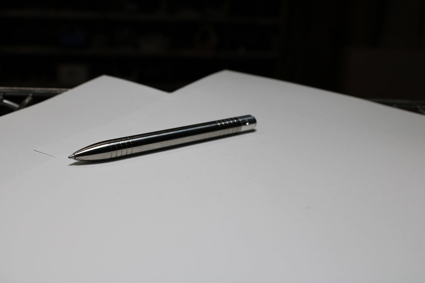 40 Clipless Click Pen - 6Al-4V Titanium - 6061 Aluminum Mechanism - Round Nose - Grip Lines - ISO G2 Schmidt EF9000 Refill