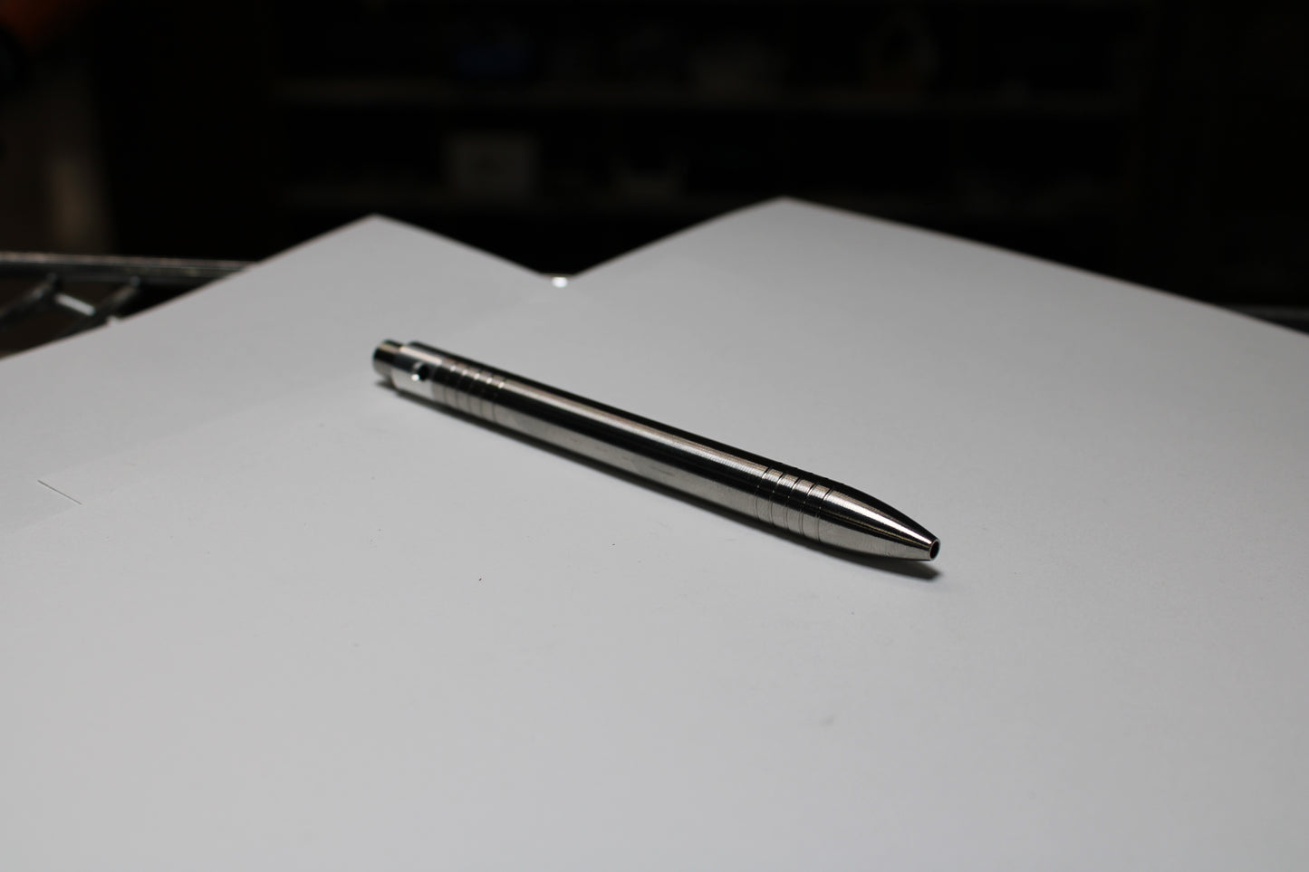 40 Clipless Click Pen - 6Al-4V Titanium - 6061 Aluminum Mechanism - Round Nose - Grip Lines - ISO G2 Schmidt EF9000 Refill