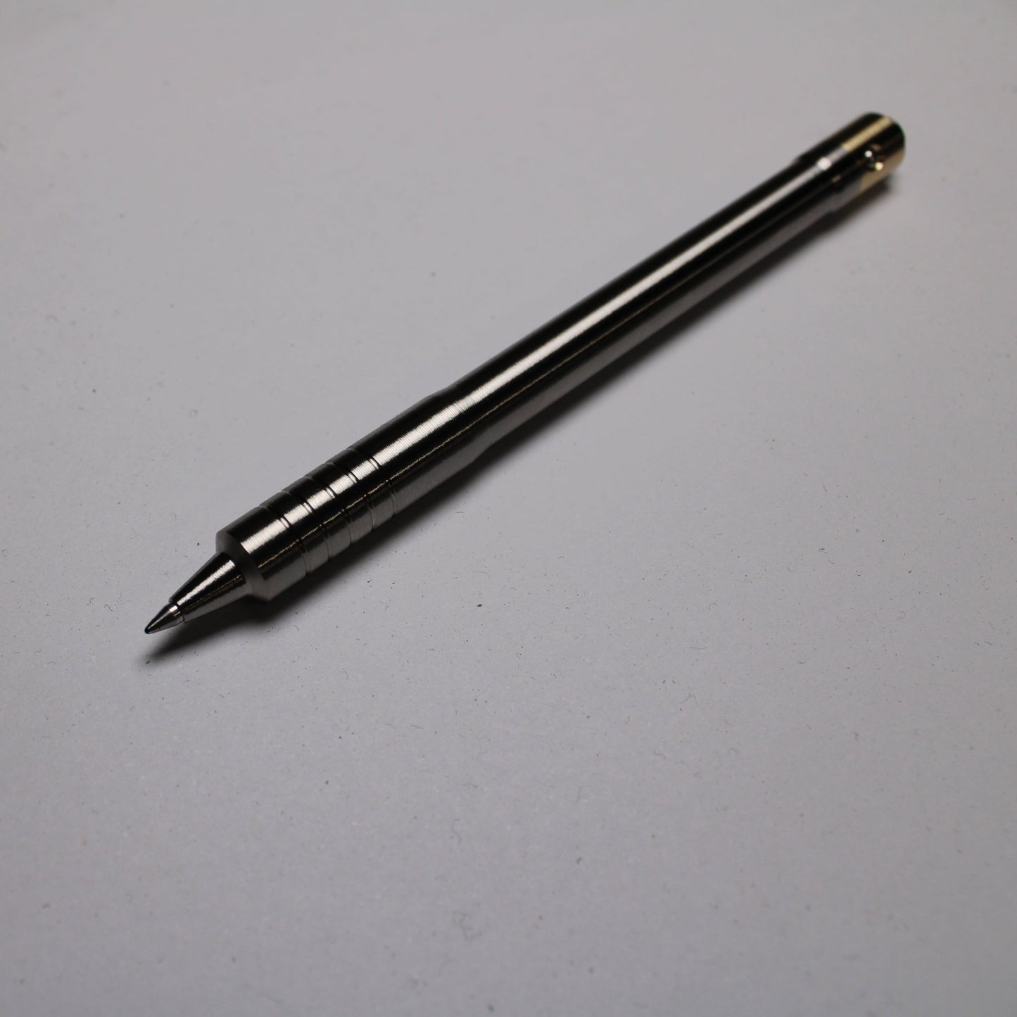 38 Clipless Click Pen - 6Al-4V Titanium Recessed Body - Step Nose Grip Lines - C63000 Bronze Mechanism - Pilot G2