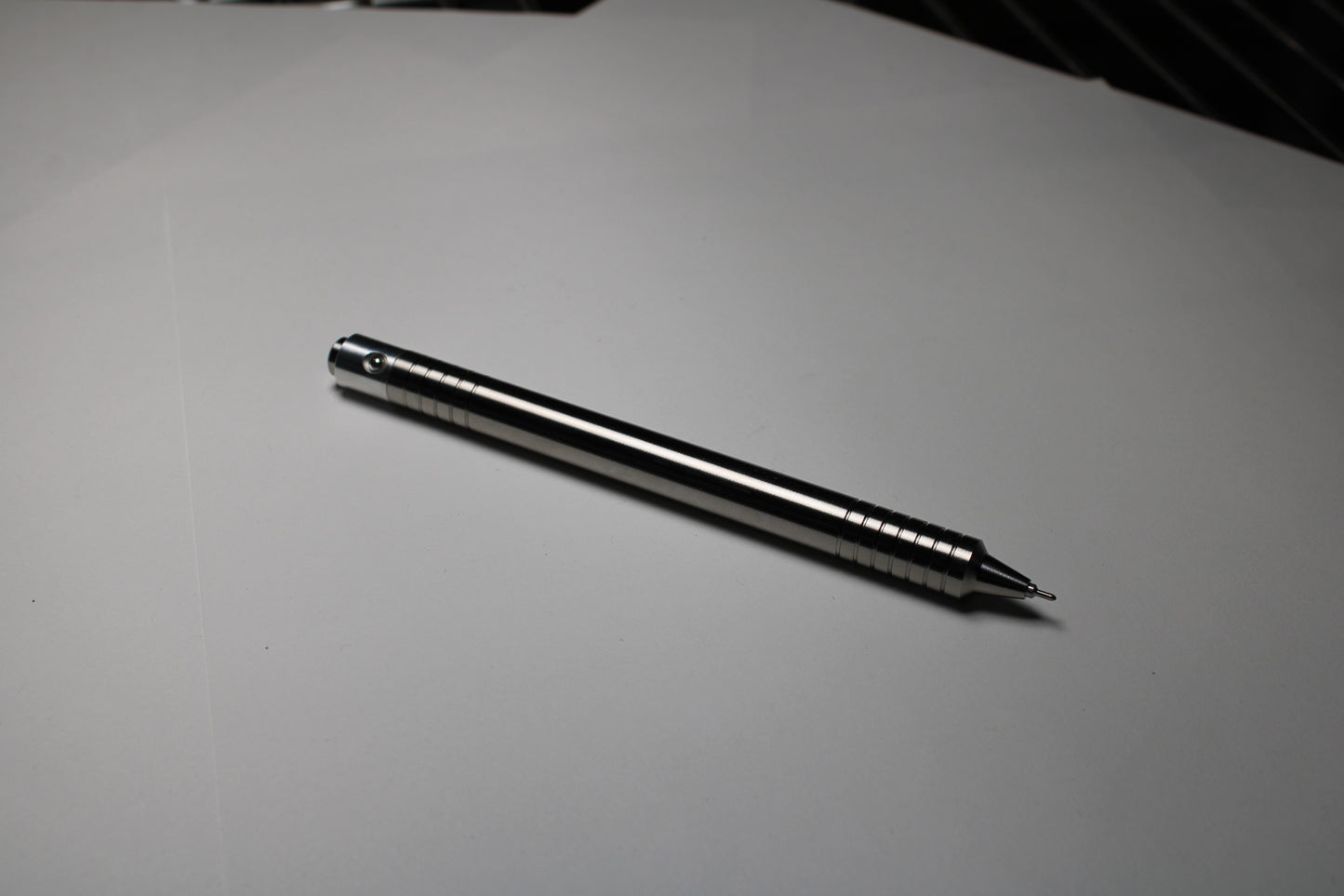 40 Clipless Click Pen - 6Al-4V Titanium - 6061 Aluminum Mechanism - Step Nose - Pentel EnerGel Needle Nose