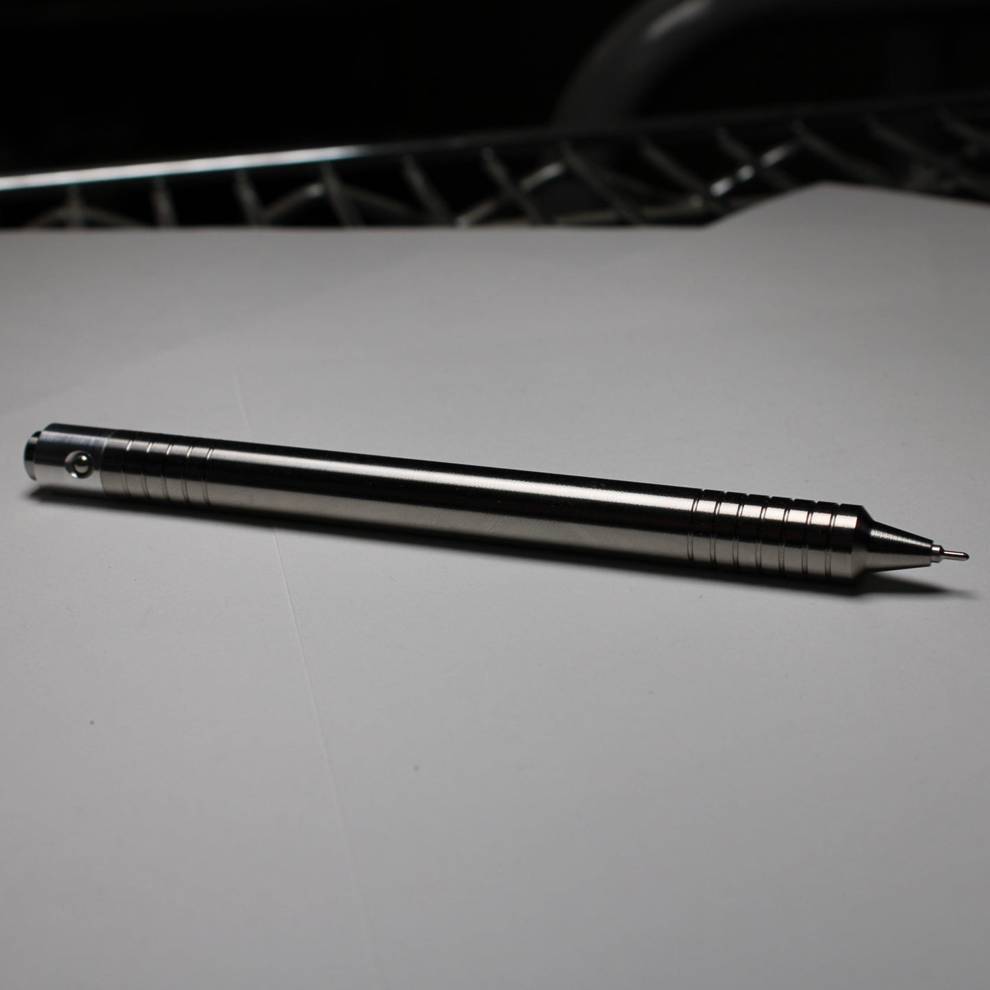 40 Clipless Click Pen - 6Al-4V Titanium - 6061 Aluminum Mechanism - Step Nose - Pentel EnerGel Needle Nose