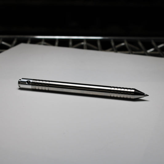 40 Clipless Click Pen - 6Al-4V Titanium - 6061 Aluminum Mechanism - Conical Nose - Schmidt P8126 Refill