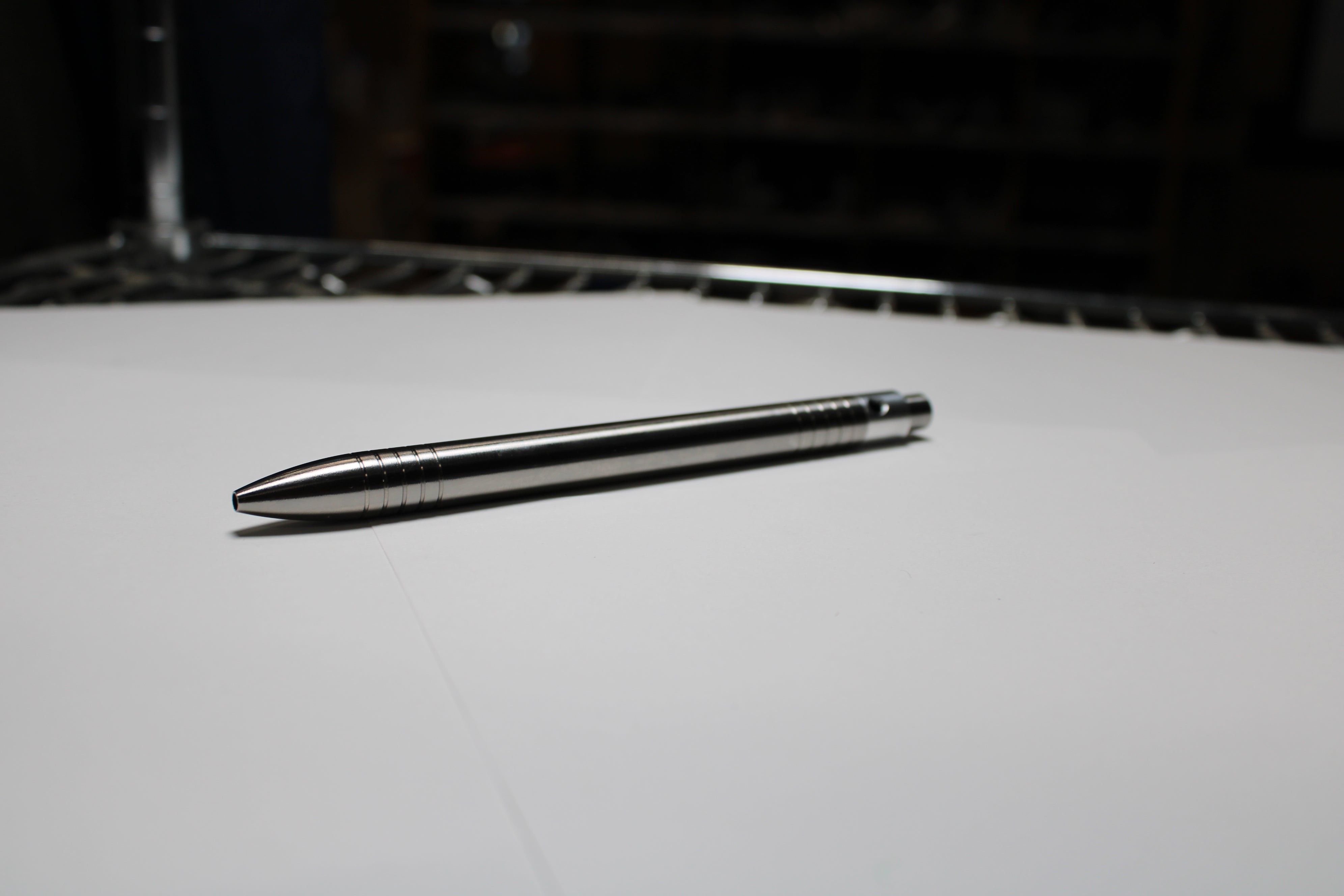 40 Clipless Click Pen - 6Al-4V Titanium - 6061 Aluminum Mechanism