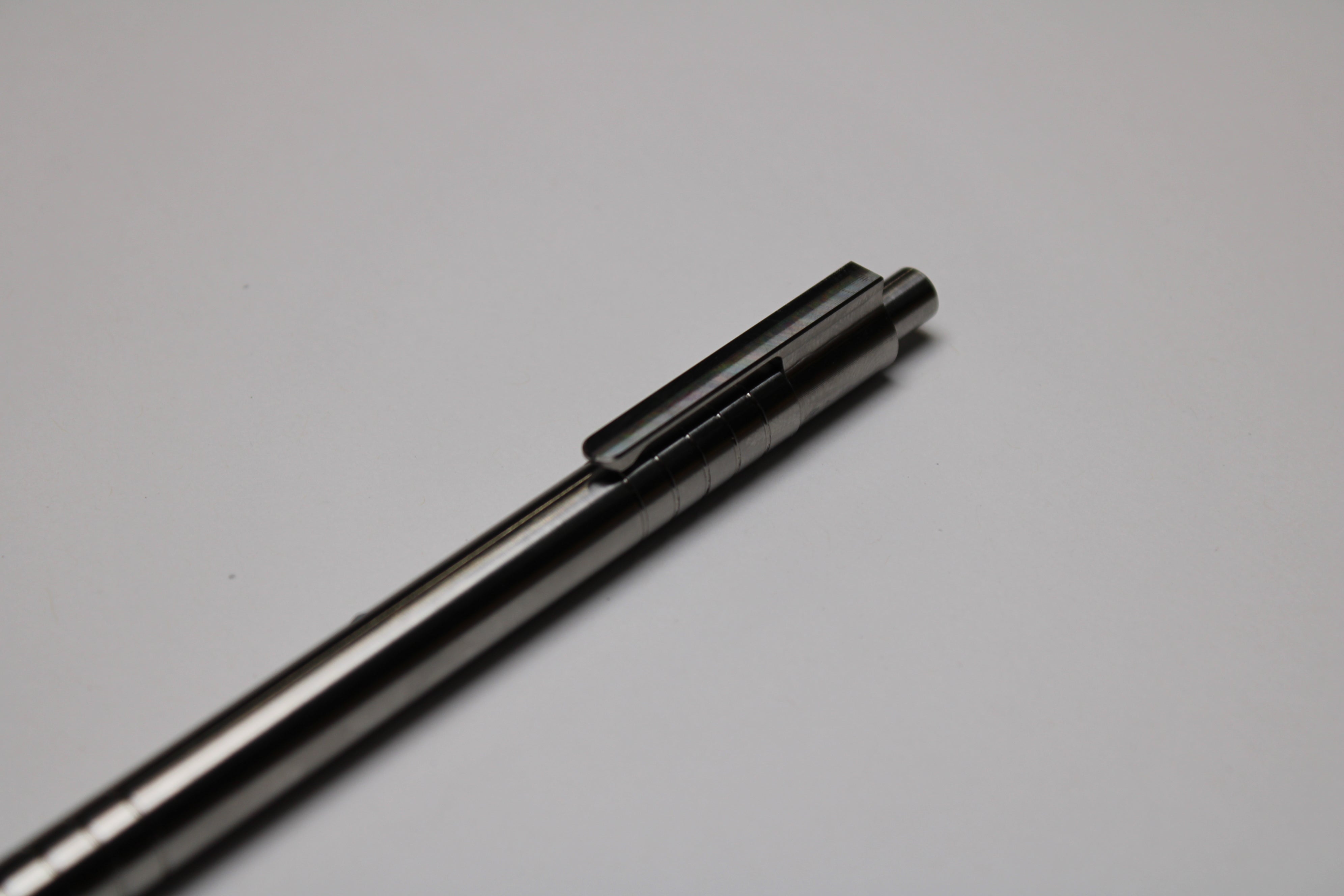 36 Click Clipped Pen - 6Al-4V Titanium - Step Nose - Grip Lines