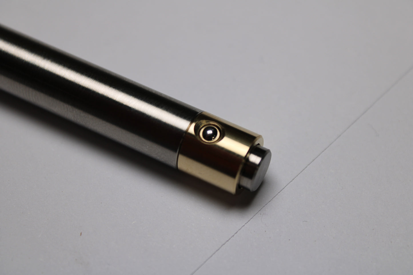 45 Clipless Click Pen - 6Al-4V Titanium  - Round Nose Grip Lines - C63000 Bronze Mechanism - Uni-Ball Signo UMR-83