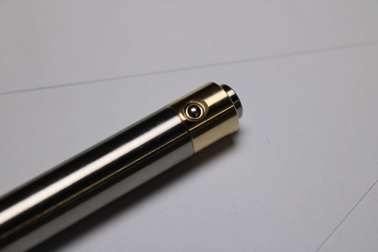 45 Clipless Click Pen - 6Al-4V Titanium  - Round Nose Grip Lines - C63000 Bronze Mechanism - Uni-Ball Signo UMR-83