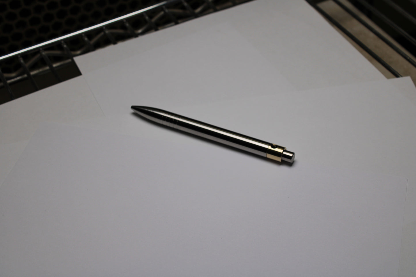 45 Clipless Click Pen - 6Al-4V Titanium  - Round Nose Grip Lines - C63000 Bronze Mechanism - Uni-Ball Signo UMR-83