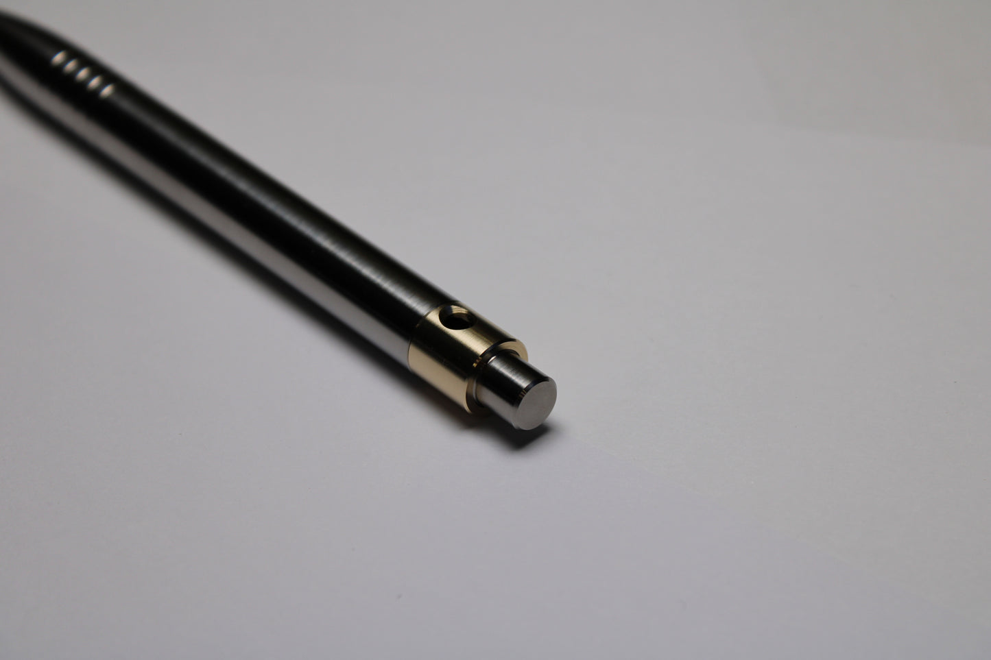 45 Clipless Click Pen - 6Al-4V Titanium  - Round Nose Grip Lines - C63000 Bronze Mechanism - Uni-Ball Signo UMR-83