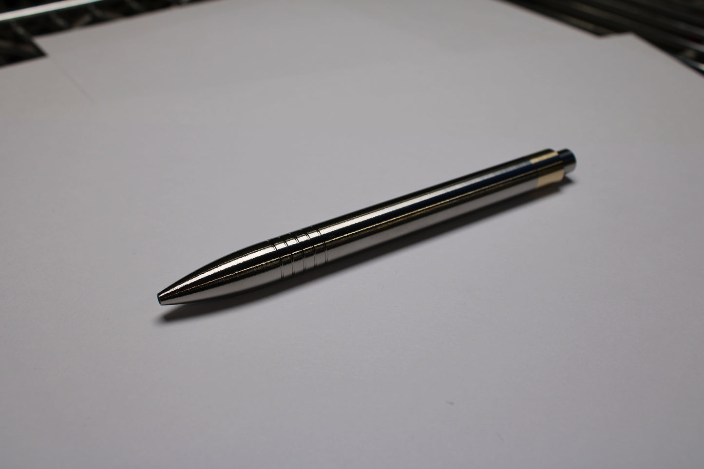 45 Clipless Click Pen - 6Al-4V Titanium  - Round Nose Grip Lines - C63000 Bronze Mechanism - Uni-Ball Signo UMR-83