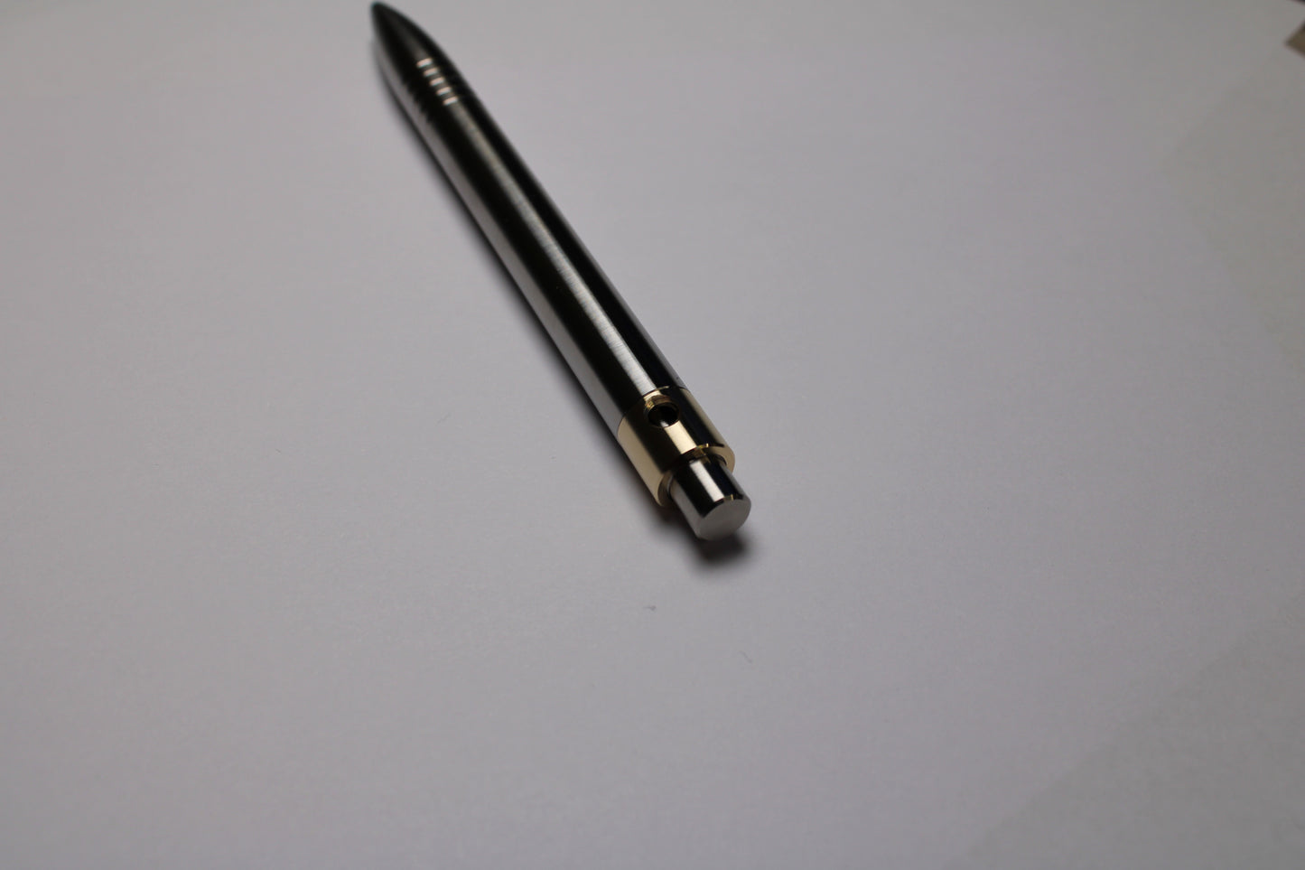 45 Clipless Click Pen - 6Al-4V Titanium  - Round Nose Grip Lines - C63000 Bronze Mechanism - Uni-Ball Signo UMR-83