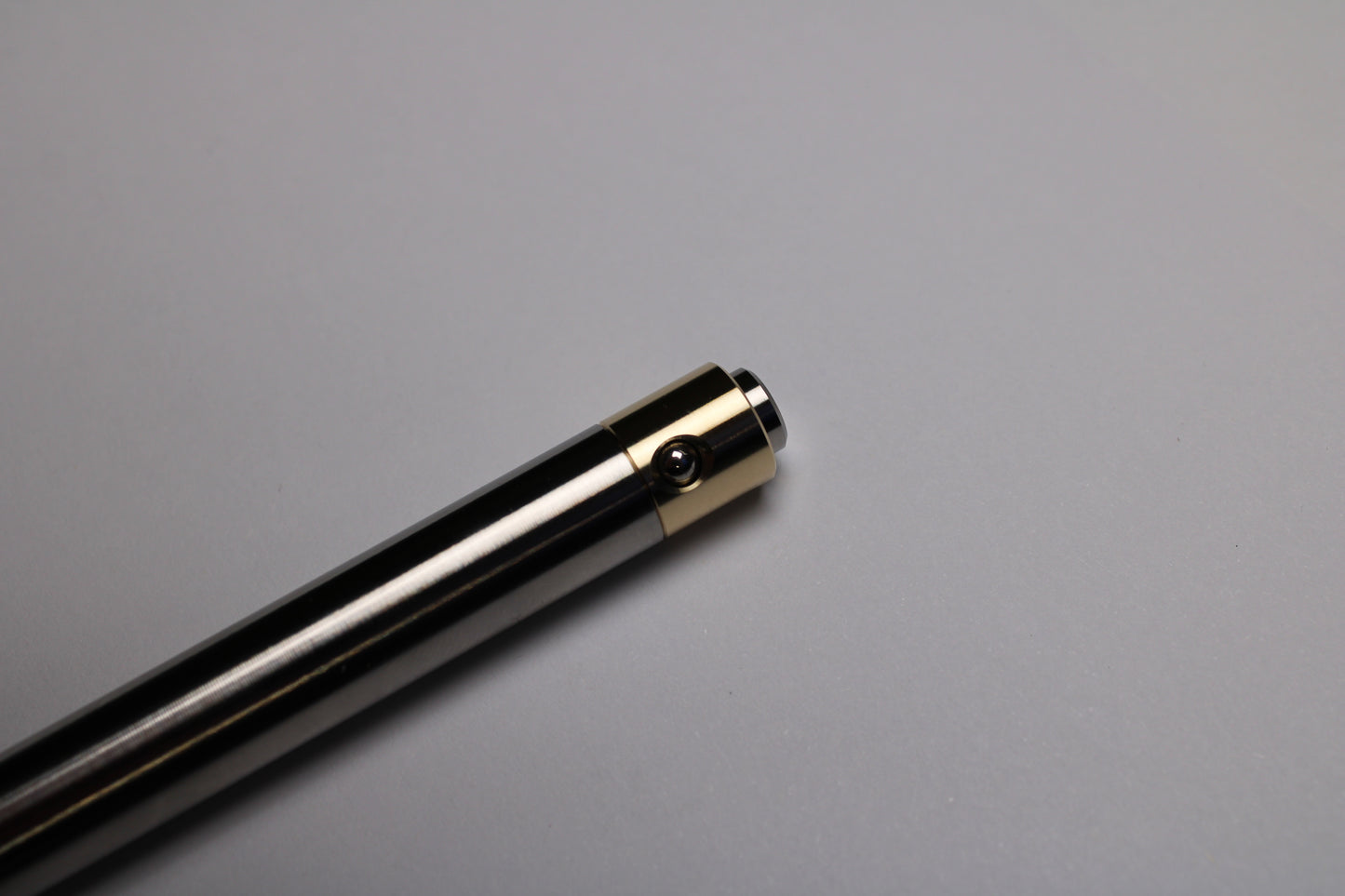 45 Clipless Click Pen - 6Al-4V Titanium  - Round Nose Grip Lines - C63000 Bronze Mechanism - Uni-Ball Signo UMR-83