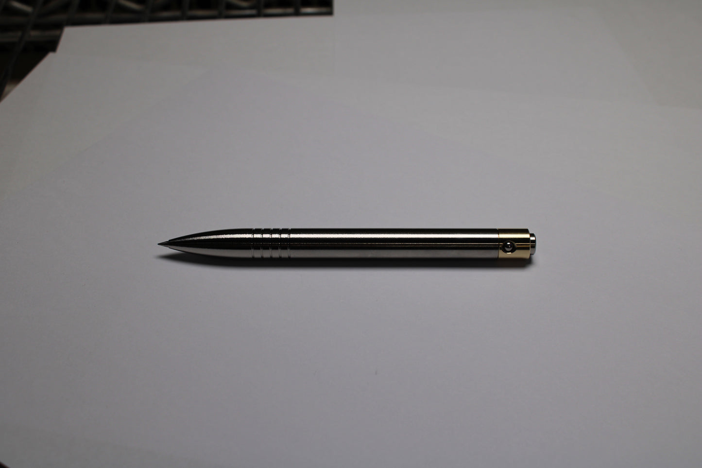 45 Clipless Click Pen - 6Al-4V Titanium  - Round Nose Grip Lines - C63000 Bronze Mechanism - Uni-Ball Signo UMR-83