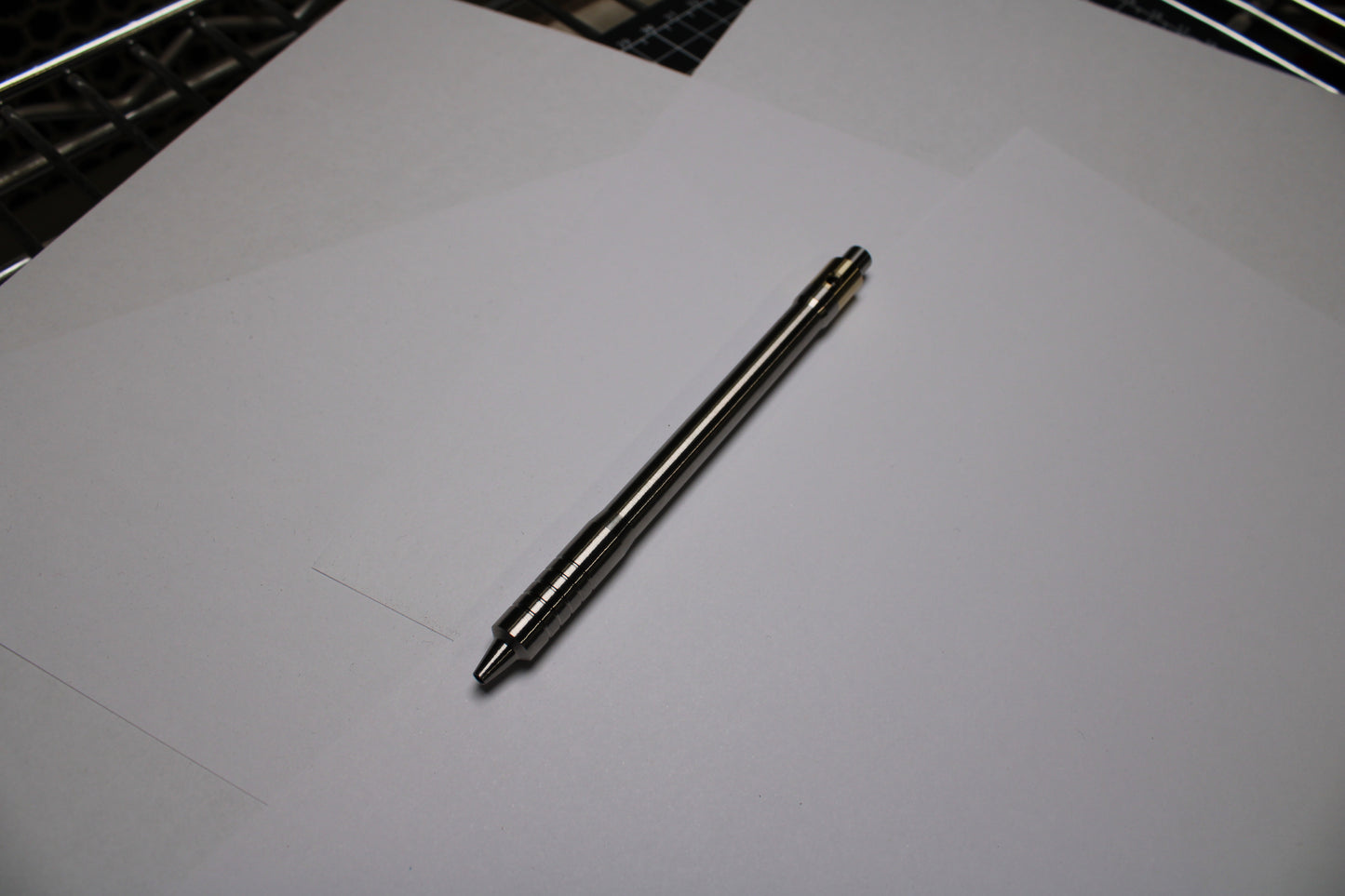 38 Clipless Click Pen - 6Al-4V Titanium Recessed Body - Step Nose Grip Lines - C63000 Bronze Mechanism - Uni SXR-5