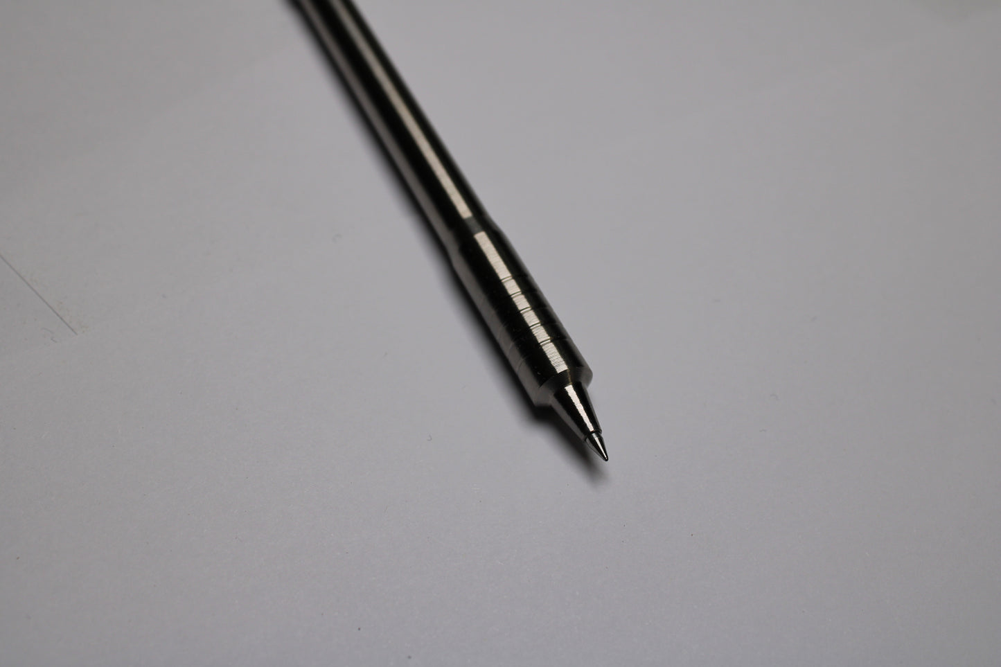 38 Clipless Click Pen - 6Al-4V Titanium - Recessed Body - Step Nose Grip Lines - Uni-Ball SXR-5