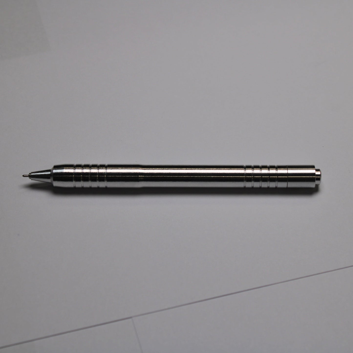 40 Grip - 38 Mechanism Clipless Click Pen - 6061 Aluminum - Triple Bevel Nose - OHTO Ceramic ISO G2