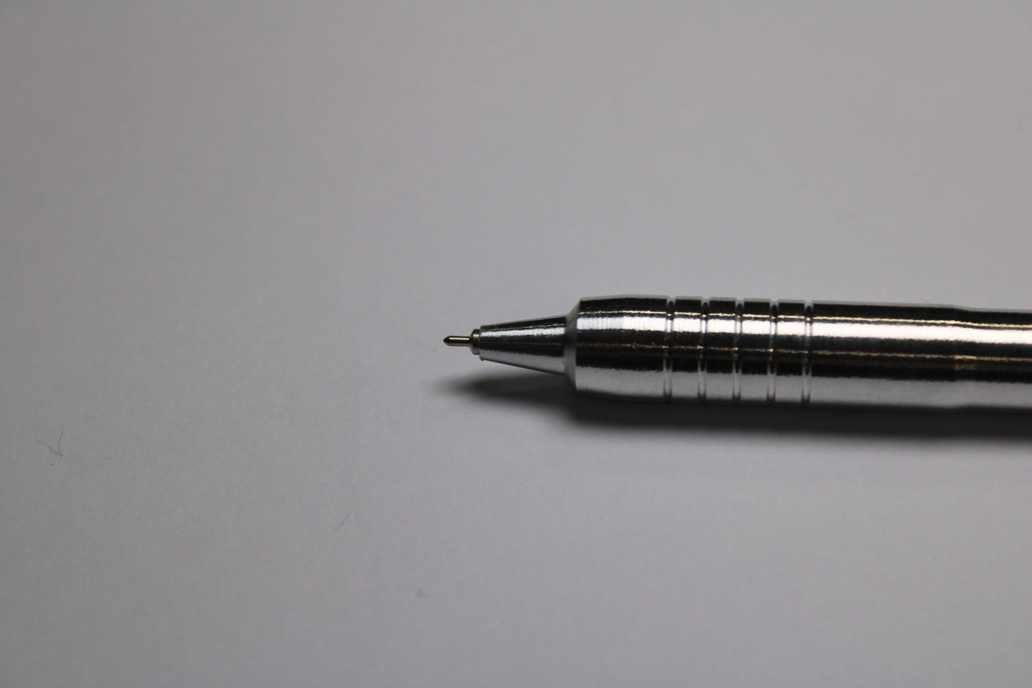 40 Grip - 38 Mechanism Clipless Click Pen - 6061 Aluminum - Triple Bevel Nose - OHTO Ceramic ISO G2