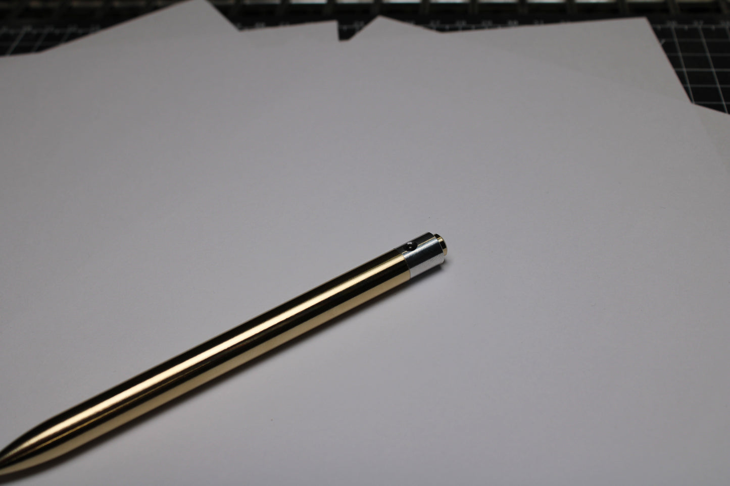 38 Clipless Click Pen - C63000 Bronze Round Nose Body And Button - 6061 Aluminum Mechanism - OHTO C-307 Rollerball Refill