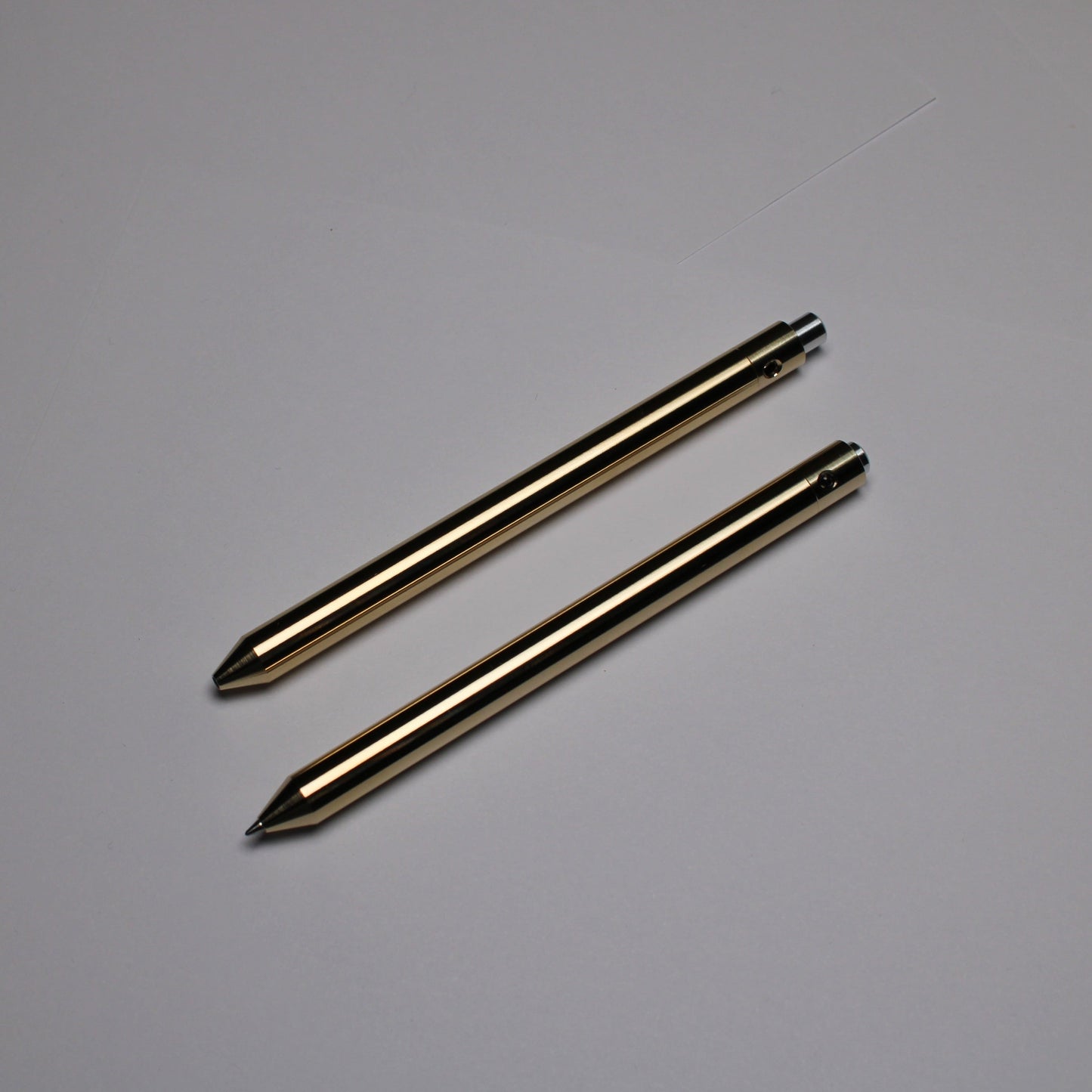 38 Clipless Click Pen - C63000 Bronze Conical Nose - 6061 Aluminum Button - Pentel EnerGel 0.7mm Metal Nose Refill
