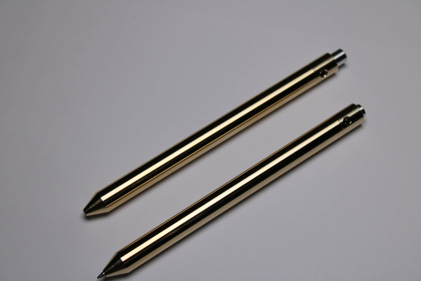 38 Clipless Click Pen - C63000 Bronze Conical Nose - 6061 Aluminum Button - Pentel EnerGel 0.7mm Metal Nose Refill