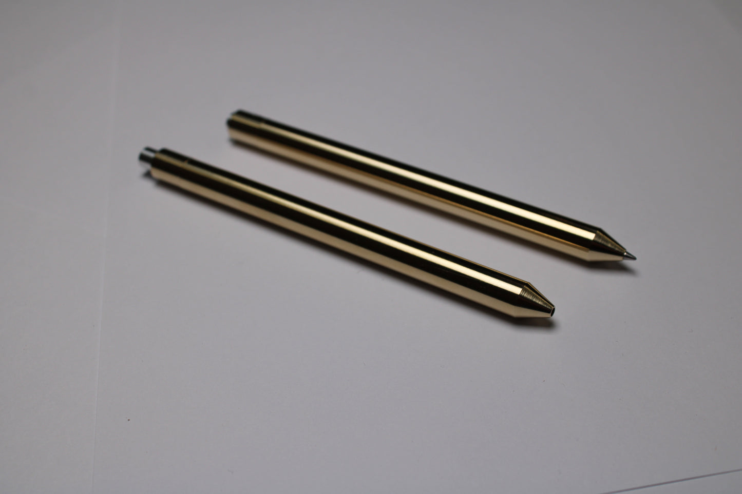 38 Clipless Click Pen - C63000 Bronze Conical Nose - 6061 Aluminum Button - Pentel EnerGel 0.7mm Metal Nose Refill