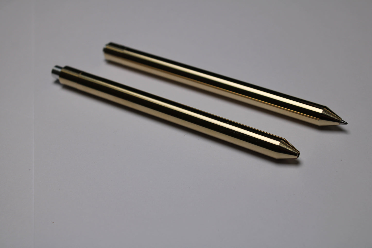 38 Clipless Click Pen - C63000 Bronze Conical Nose - 6061 Aluminum Button - Pentel EnerGel 0.7mm Metal Nose Refill