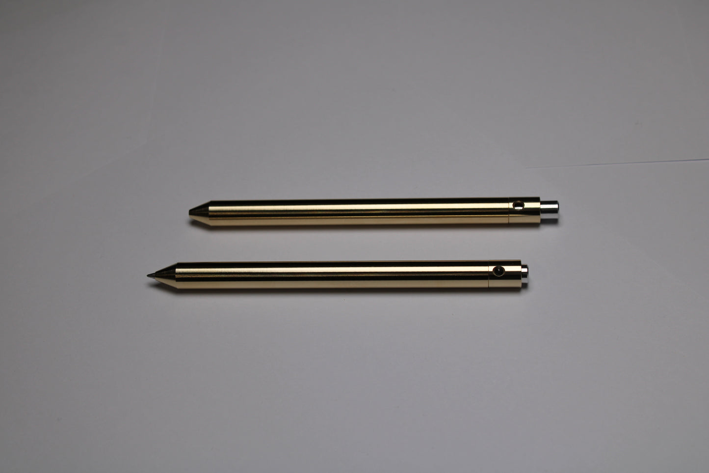 38 Clipless Click Pen - C63000 Bronze Conical Nose - 6061 Aluminum Button - Pentel EnerGel 0.7mm Metal Nose Refill