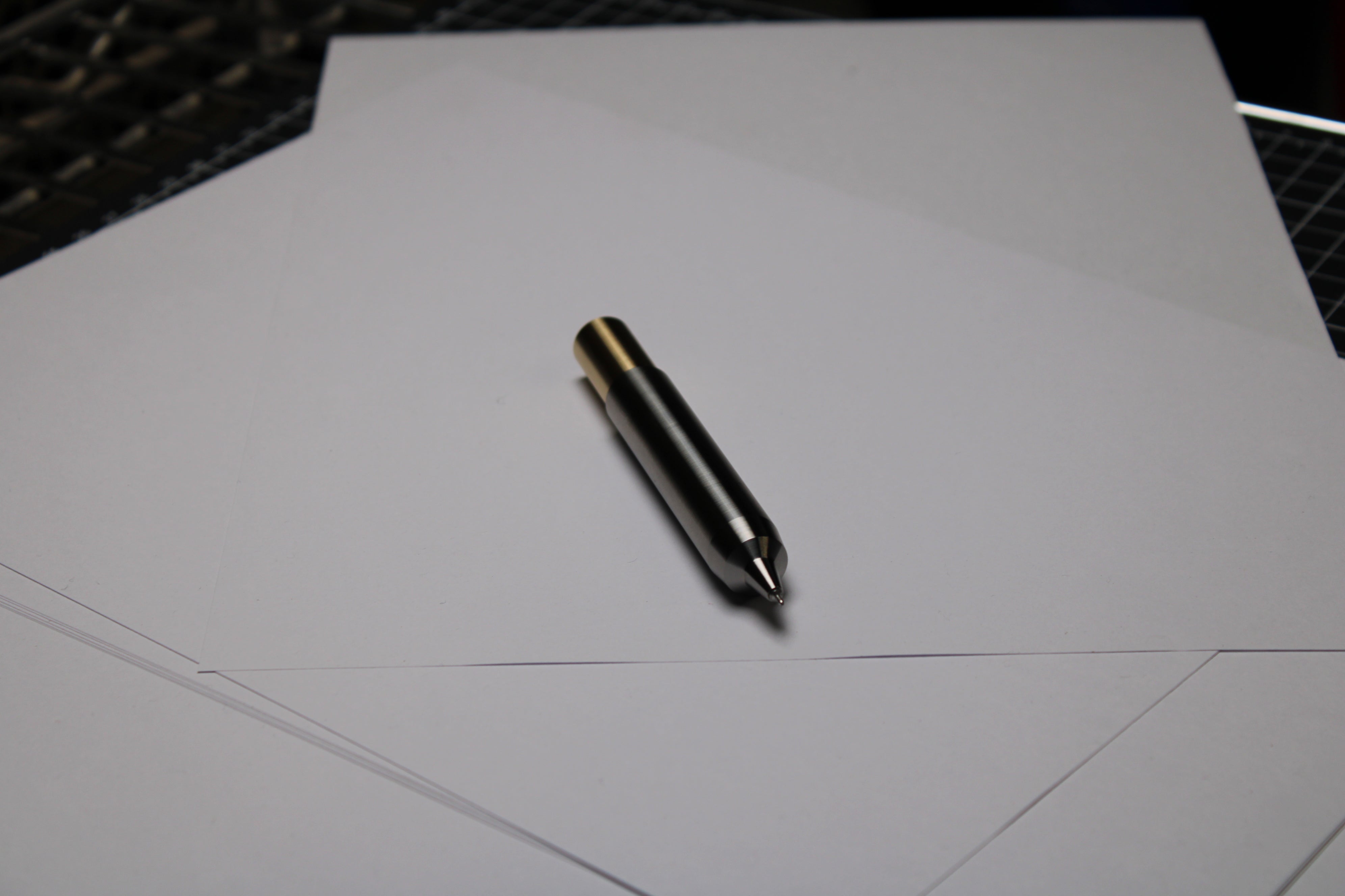 55 Clipless Twist Pen - 6Al-4V Titanium Body - C63000 Bronze Top