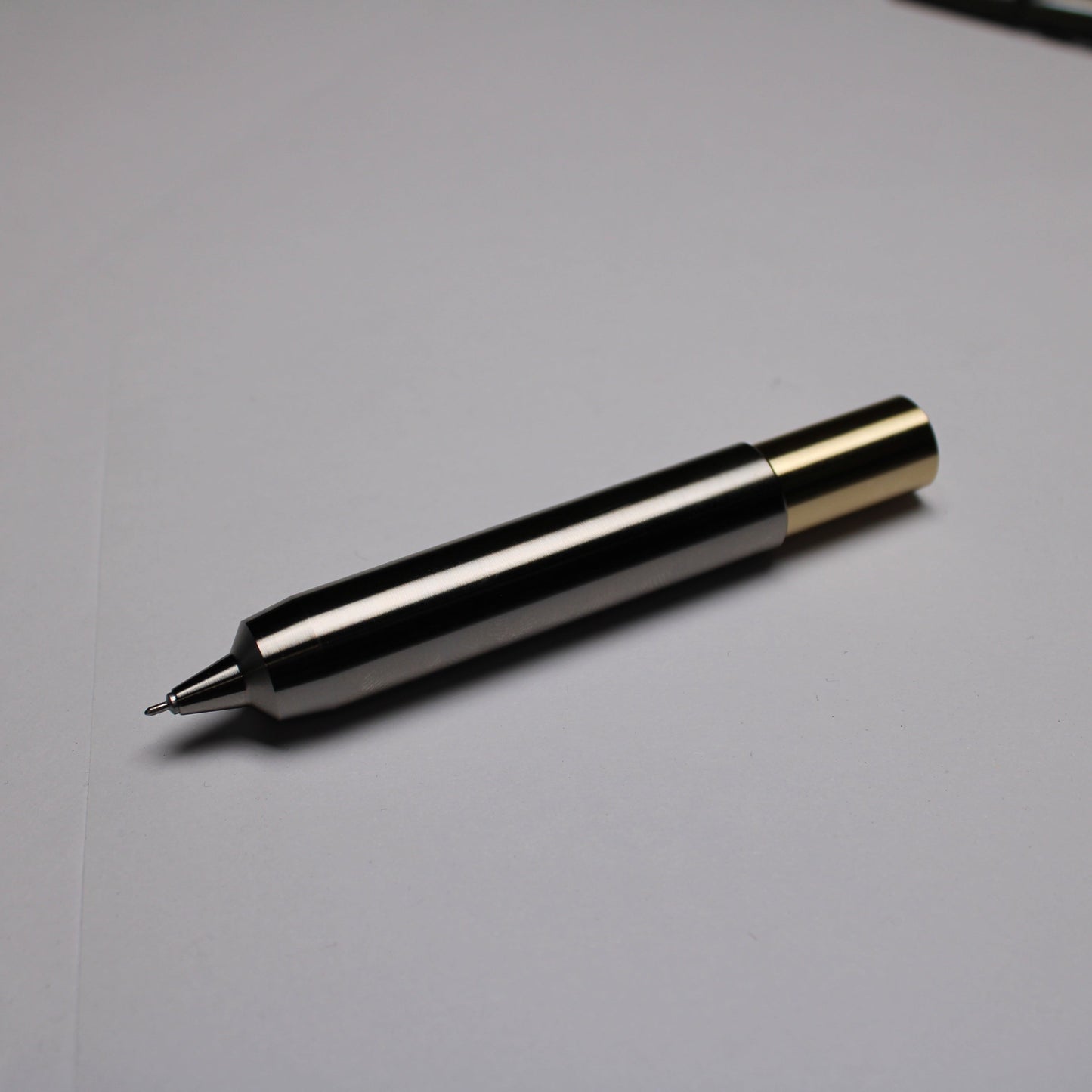 55 Clipless Twist Pen - 6Al-4V Titanium Body - C63000 Bronze Top - Triple Bevel Nose - OHTO Ceramic ISO G2