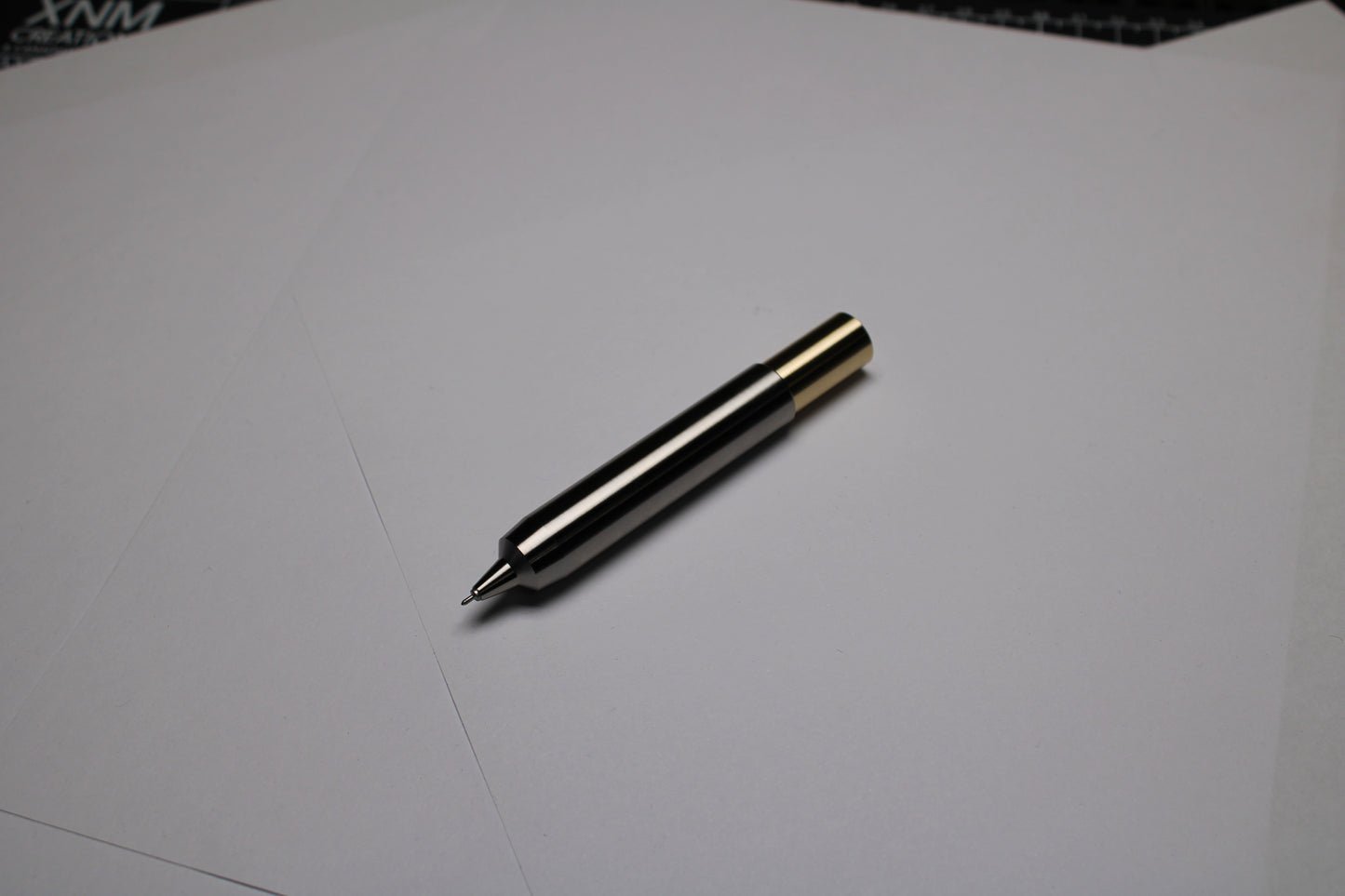 55 Clipless Twist Pen - 6Al-4V Titanium Body - C63000 Bronze Top - Triple Bevel Nose - OHTO Ceramic ISO G2