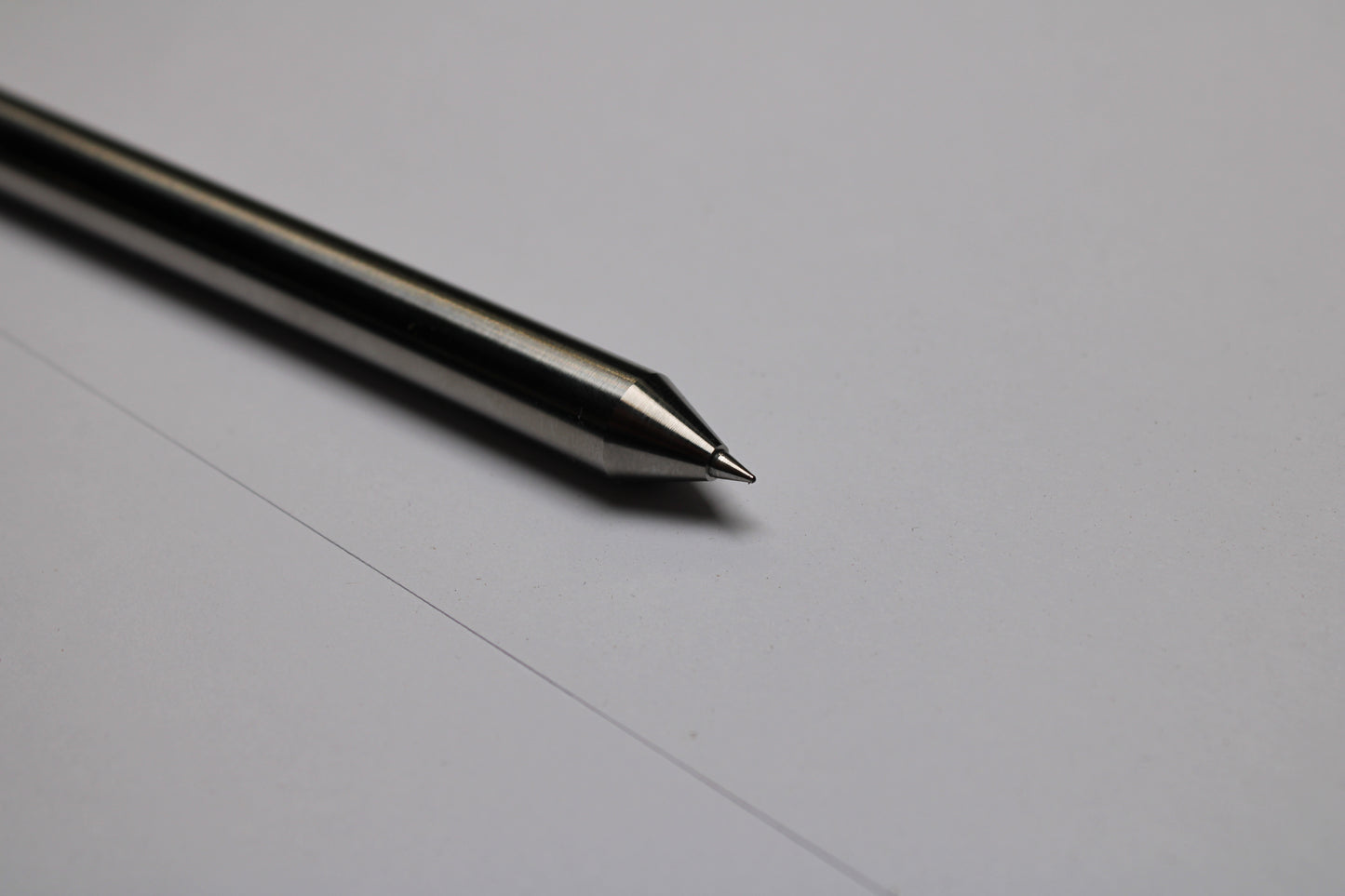 38 Clipless Click Pen - 6Al-4V Titanium Conical Nose - C63000 Bronze Mechanism - OHTO C-305 Rollerball Refill