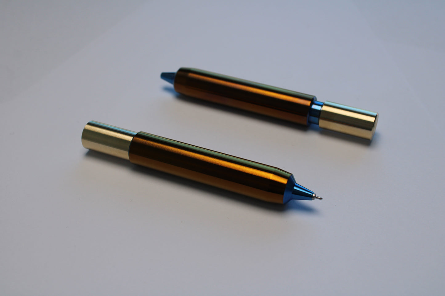 55 Clipless Twist Pen x KVR - 6Al-4V Titanium Body - C63000 Bronze Top - Triple Bevel Nose - OHTO Ceramic ISO G2