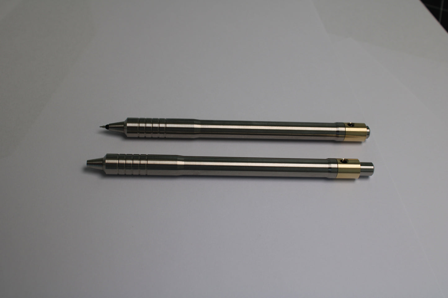 38 Clipless Click Pen - 6Al-4V Titanium Recessed Body Step Nose - Grip Lines - Pilot Juice Up 0.4mm
