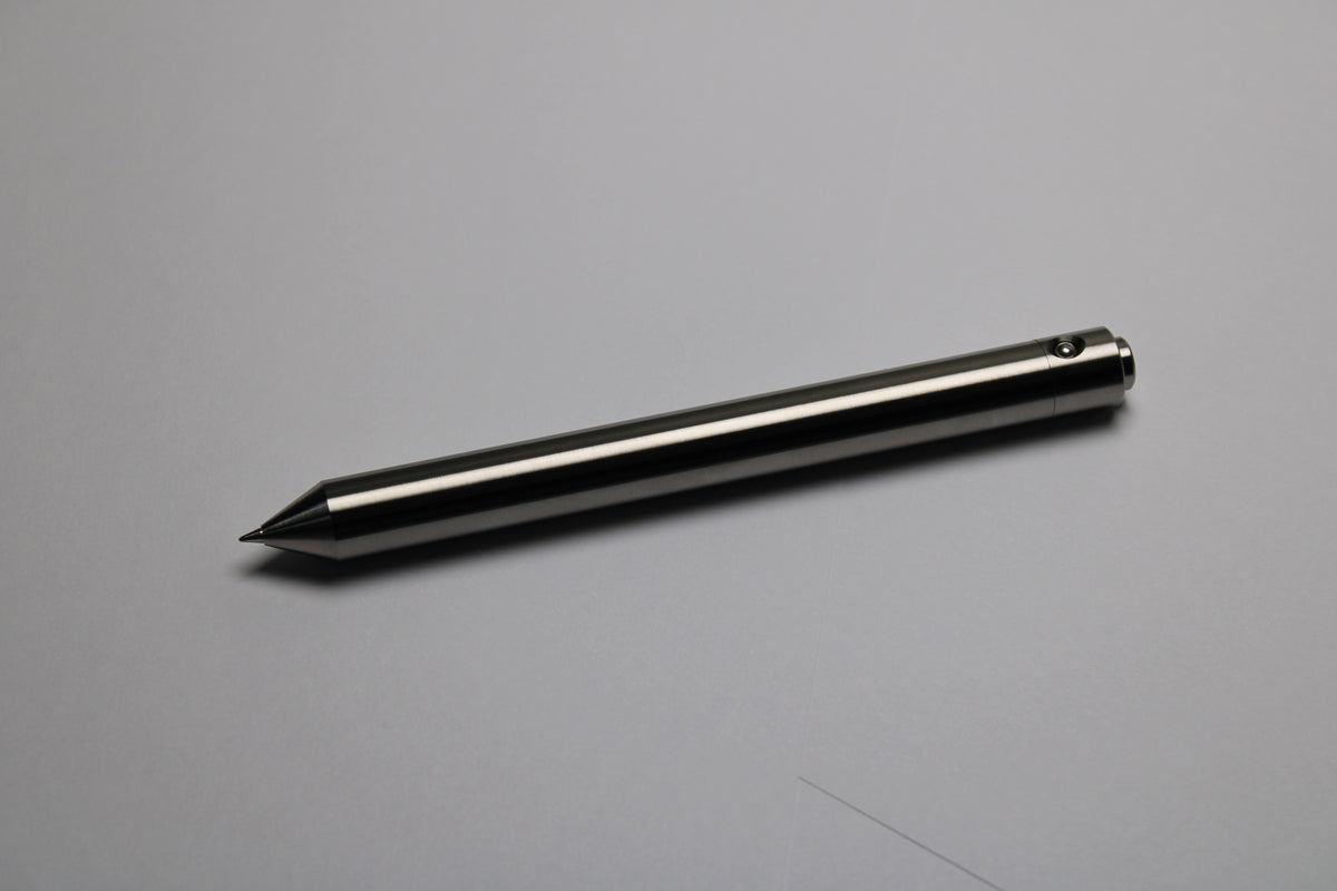 48 Clipless Click Pen - 6Al-4V Titanium - Conical Nose - Zebra Sarasa