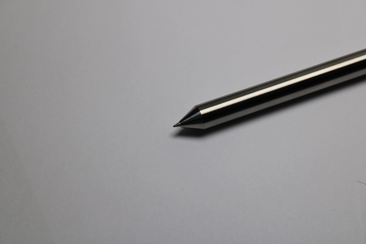48 Clipless Click Pen - 6Al-4V Titanium - Conical Nose - Zebra Sarasa