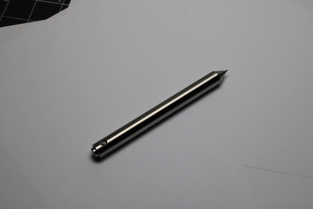 48 Clipless Click Pen - 6Al-4V Titanium - Conical Nose - Zebra Sarasa